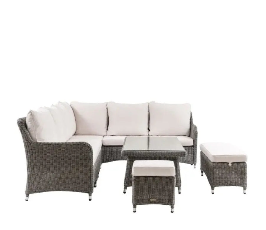 A 5-piece outdoor patio set featuring a grey wicker sectional sofa with cream cushions, a matching rectangular rising coffee table, and two ottomans on a solid white background.