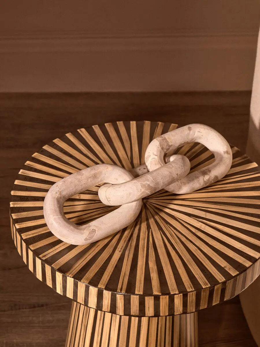 Chocolate brown natural marble chain sculpture with three interlocked links, beautiful displayed on a coffee table, a tray or a stack of coffee table books. Available to purchase at Albury House Interiors. 