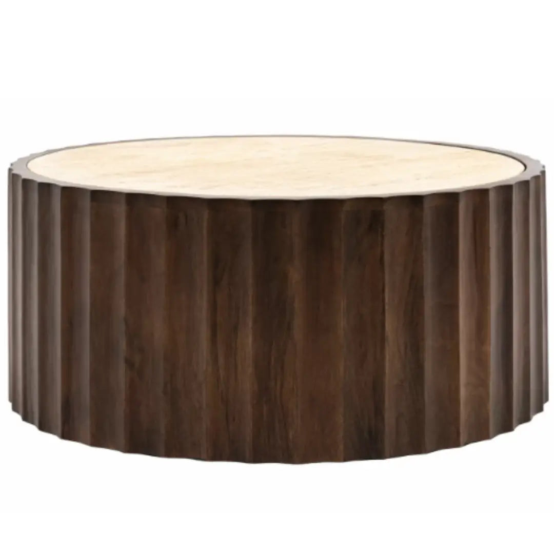 Cisca round coffee table with dark stained fluted base crafted from mango wood, and inlaid natural travertine stone top in neutral colour. Available to purchase from Albury House Interiors. 