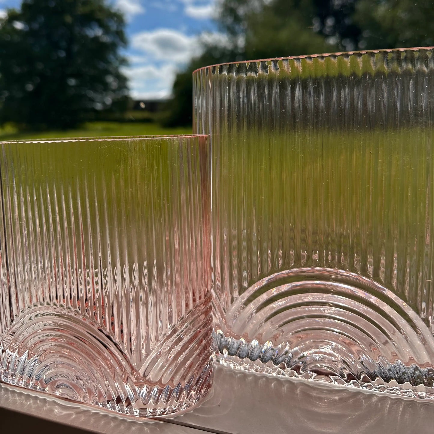 pink-ribbed-glass-vases-with-arch-detail-at-albury-house-interiors