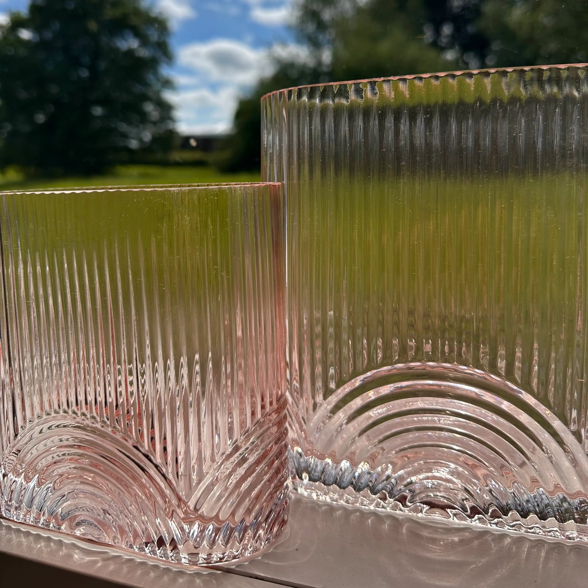 pink-ribbed-glass-vases-with-arch-detail-at-albury-house-interiors