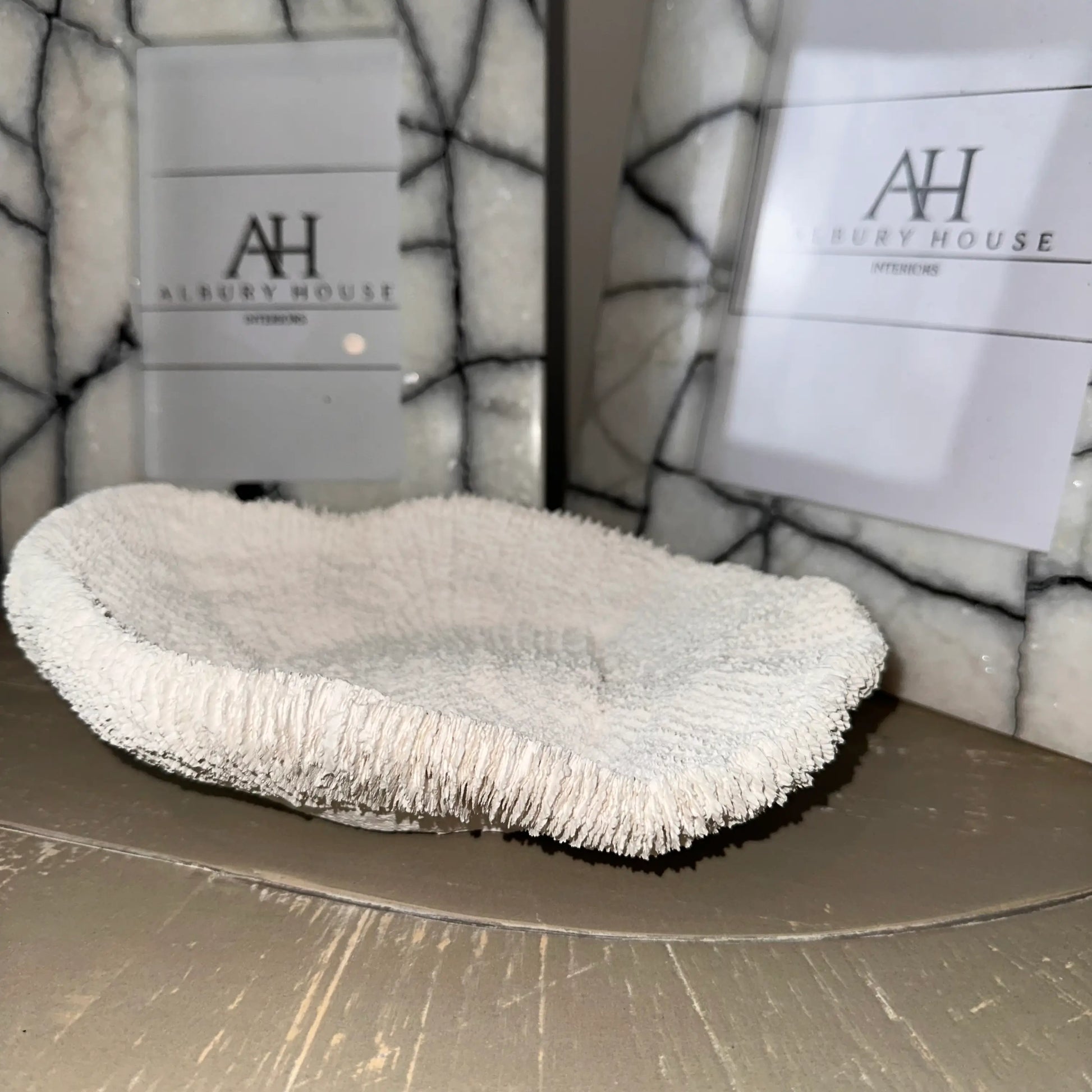 closeup-shot-of-white-faux-fungia-coral-bowl-ornament-at-albury-house-interiors-essex