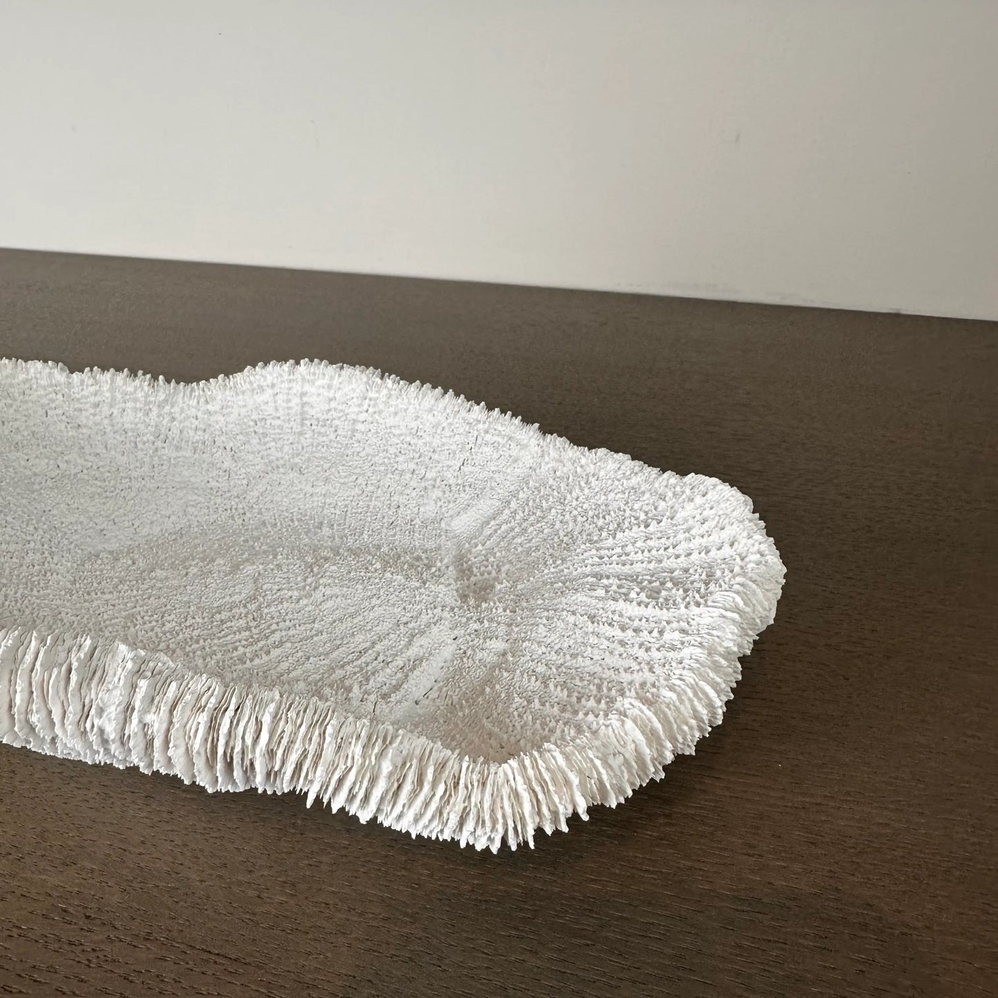 closeup-shot-of-white-faux-fungia-coral-bowl-ornament-at-albury-house-interiors-essex