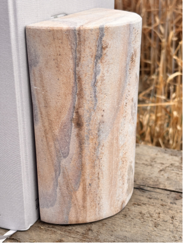 Natural sandstone bookends with rainbow patterns and swirls. Each set is entirely unique due to the natural origin of this stone. Available to purchase from Albury House Interiors, homewares and accessories in Essex. 