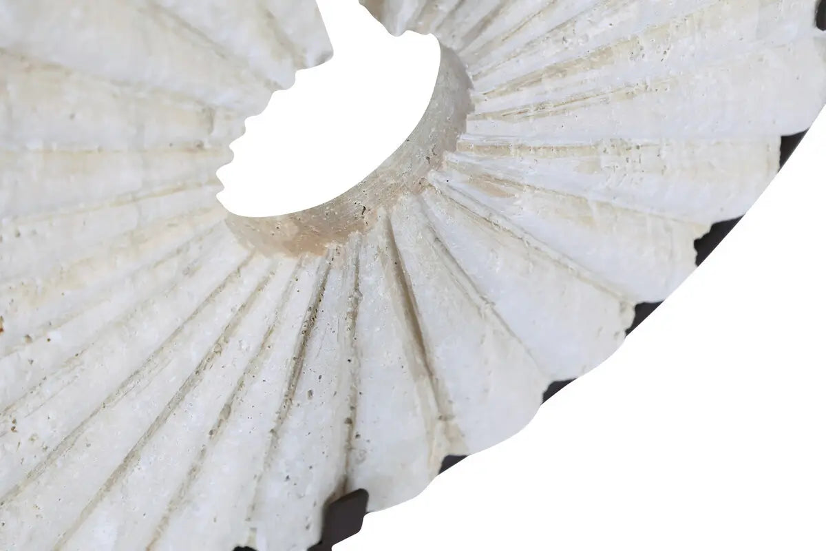 closeup-of-natural-travertine-stone-disc-sculpture-placed-on-matt-black-stand-at-albury-house-interiors