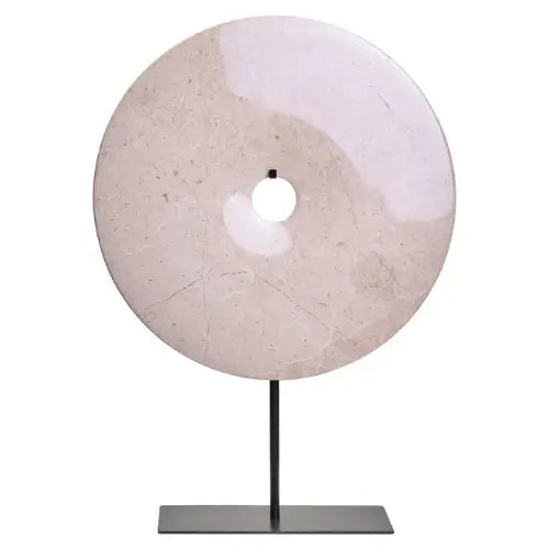 coco-cream-neutral-natural-marble-round-disc-sculpture-on-black-plinth-stand-at-albury-house-interiors