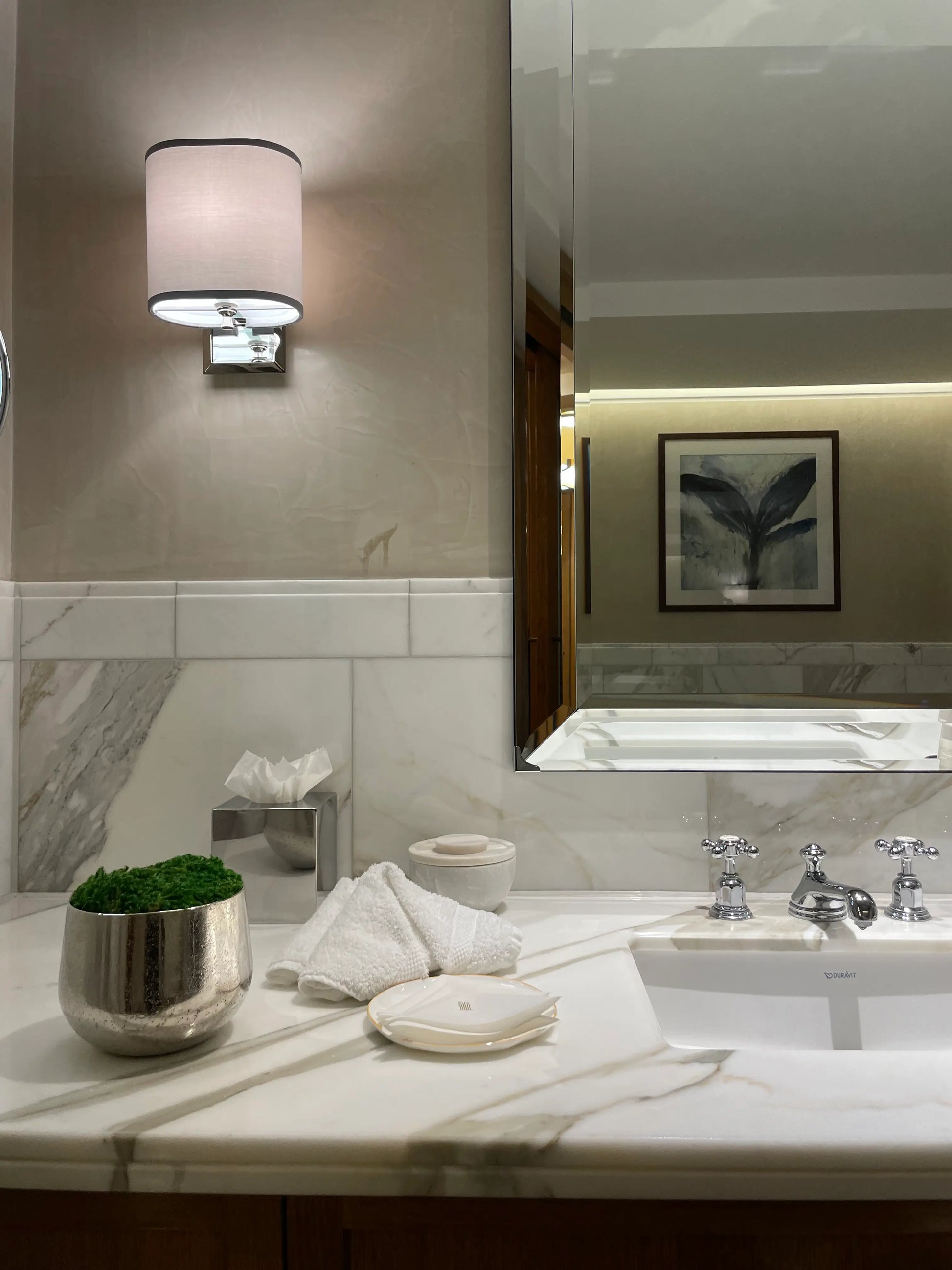 Chrome silver textured moss bowl, with preserved natural green moss, displayed in 30 suites across the iconic Corinthia Hotel London. Available to purchase from Albury House Interiors, homewares in the UK. 