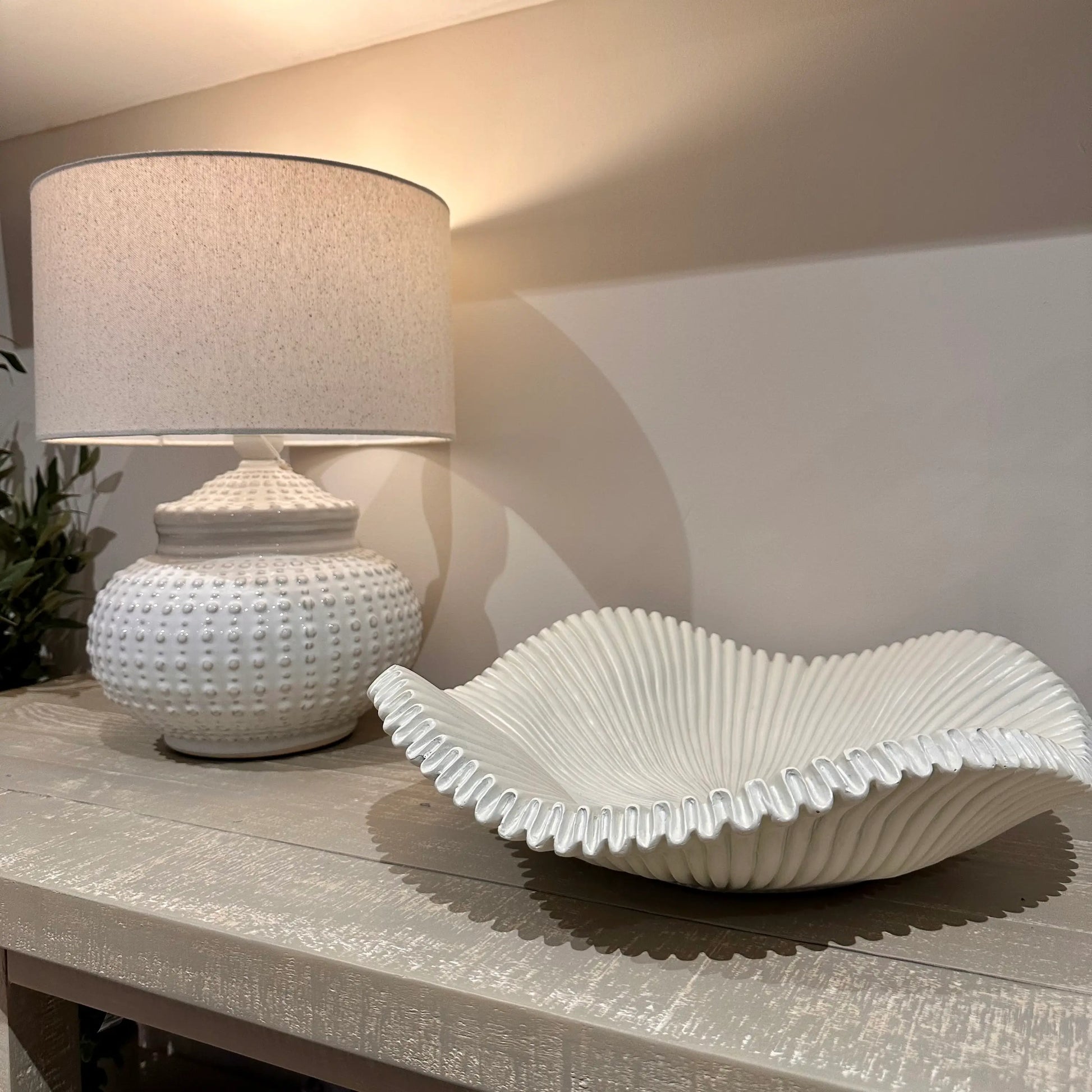 cream-wave-platter-bowl-with-ribbed-detail-and-cream-dimple-table-lamp-at-albury-house-interiors