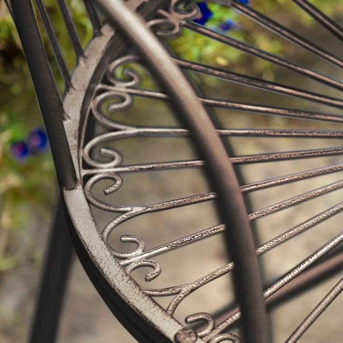 Daisy outdoor garden bistro set, small table and 2 chairs. Crafted from iron and finished in a dark bronze. Available to purchase from Albury House Interiors. 