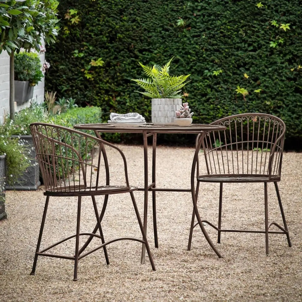 Daisy outdoor garden bistro set, small table and 2 chairs. Crafted from iron and finished in a dark bronze. Available to purchase from Albury House Interiors. 