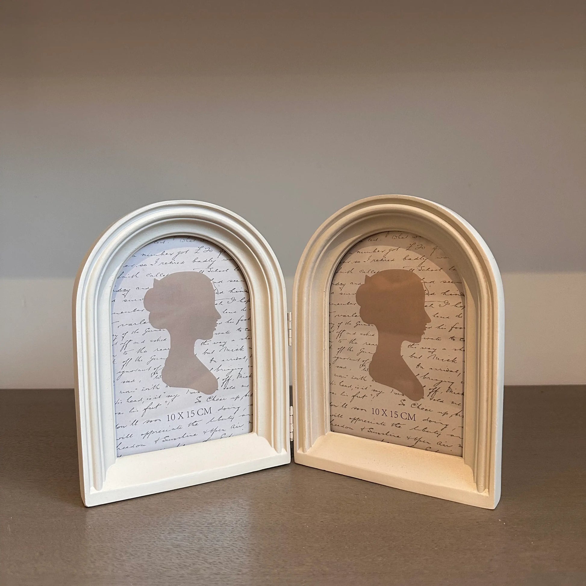 neutral-coloured-double-arched-curved-photo-frame-at-albury-house-interiors-essex