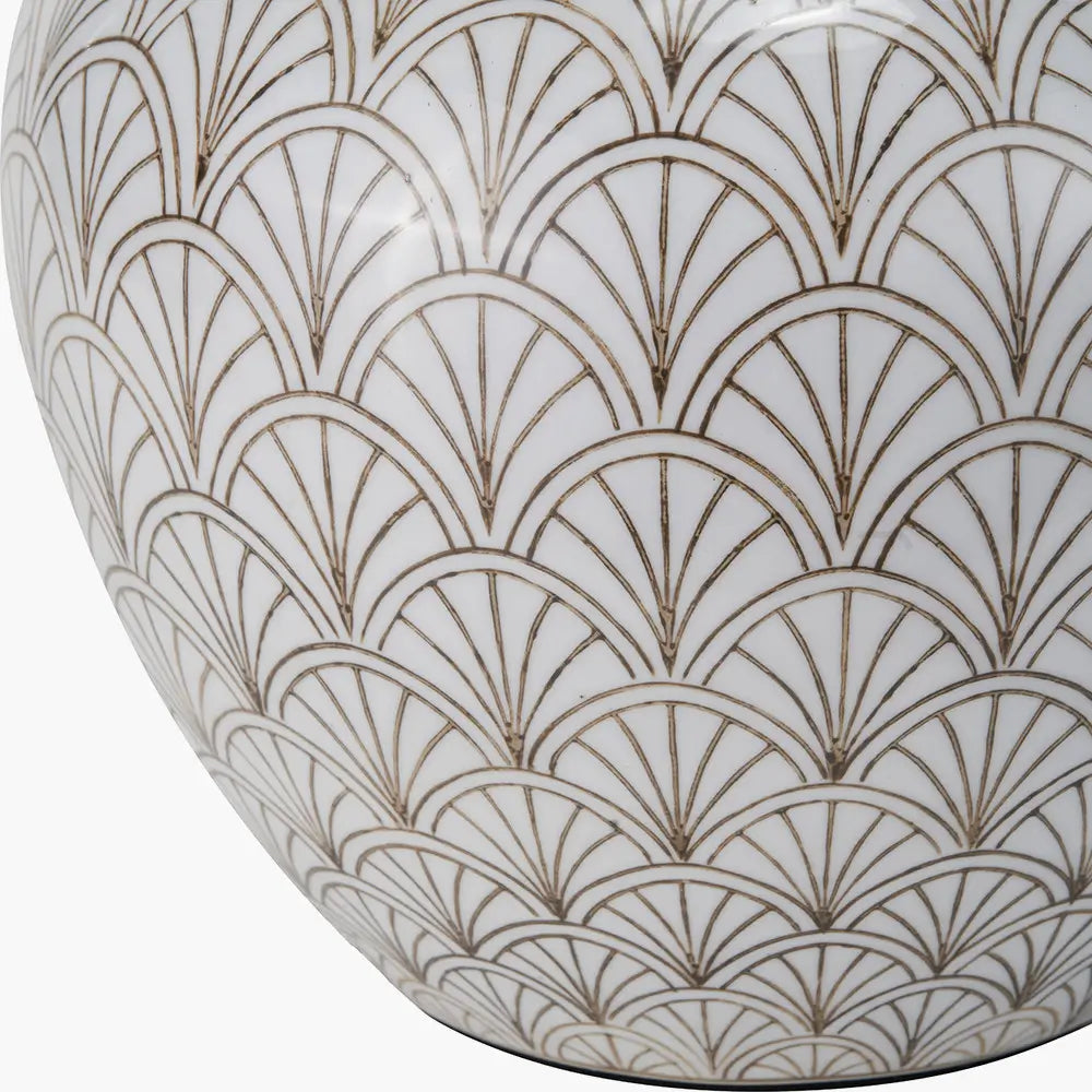white-ceramic-lamp-base-with-art-deco-fan-repeating-pattern-and-brass-detailing-at-albury-house-interiors