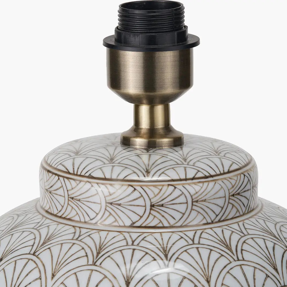 white-ceramic-lamp-base-with-art-deco-fan-repeating-pattern-and-brass-detailing-at-albury-house-interiors
