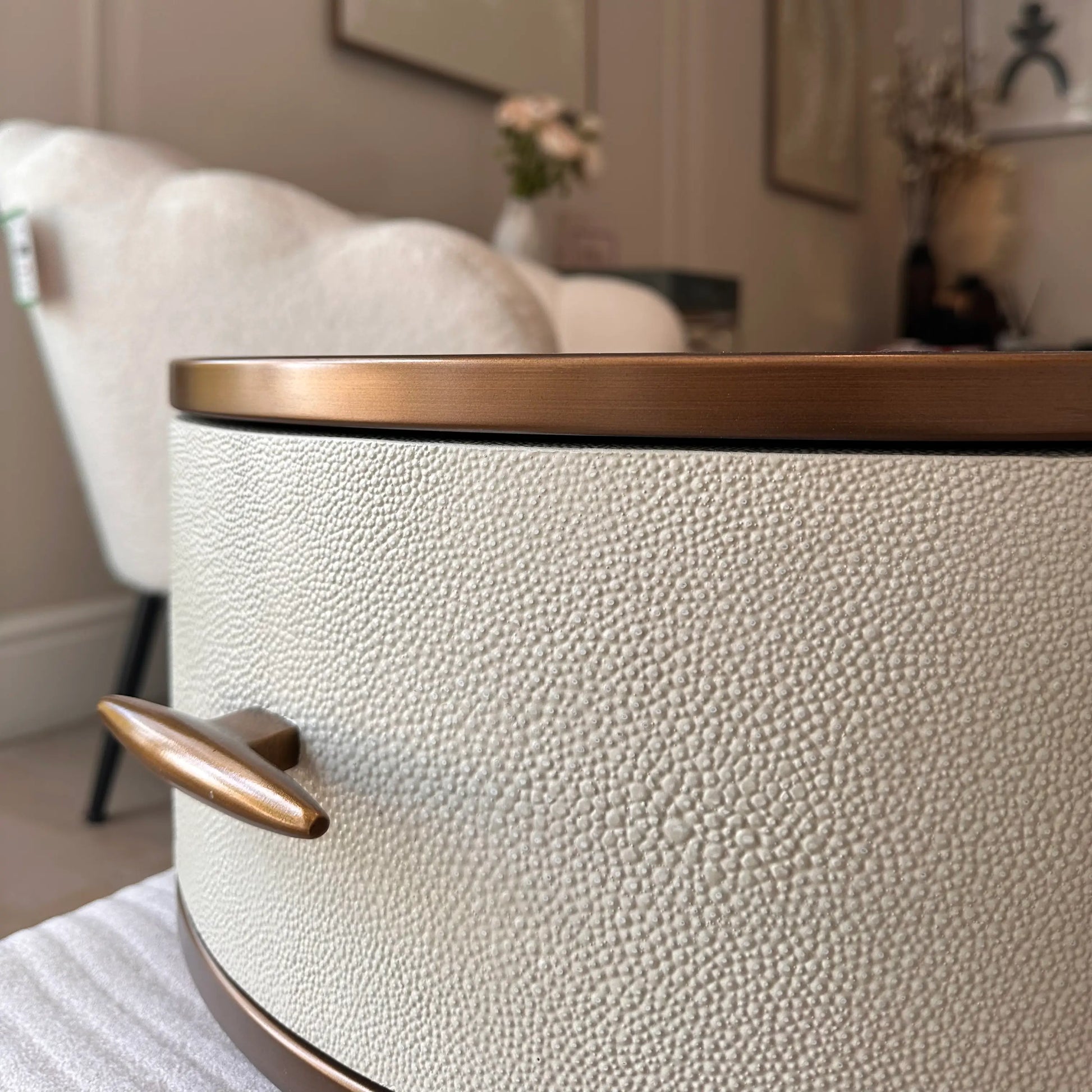 faux-ivory-shagreen-fabric-bedside-tables-ound-in-shape-with-antique-brass-metal-frame-and-legs-with-single-drawer-and-shelf-interior-design-essentials-at-albury-house-interiors