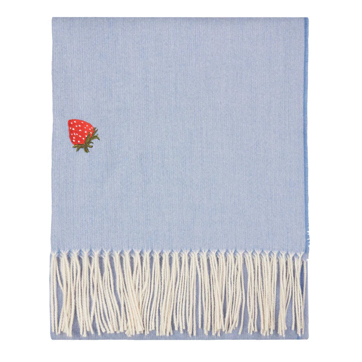 Lightweight pale blue throw blanket with a strawberry design and white fringe available at Albury House Interiors