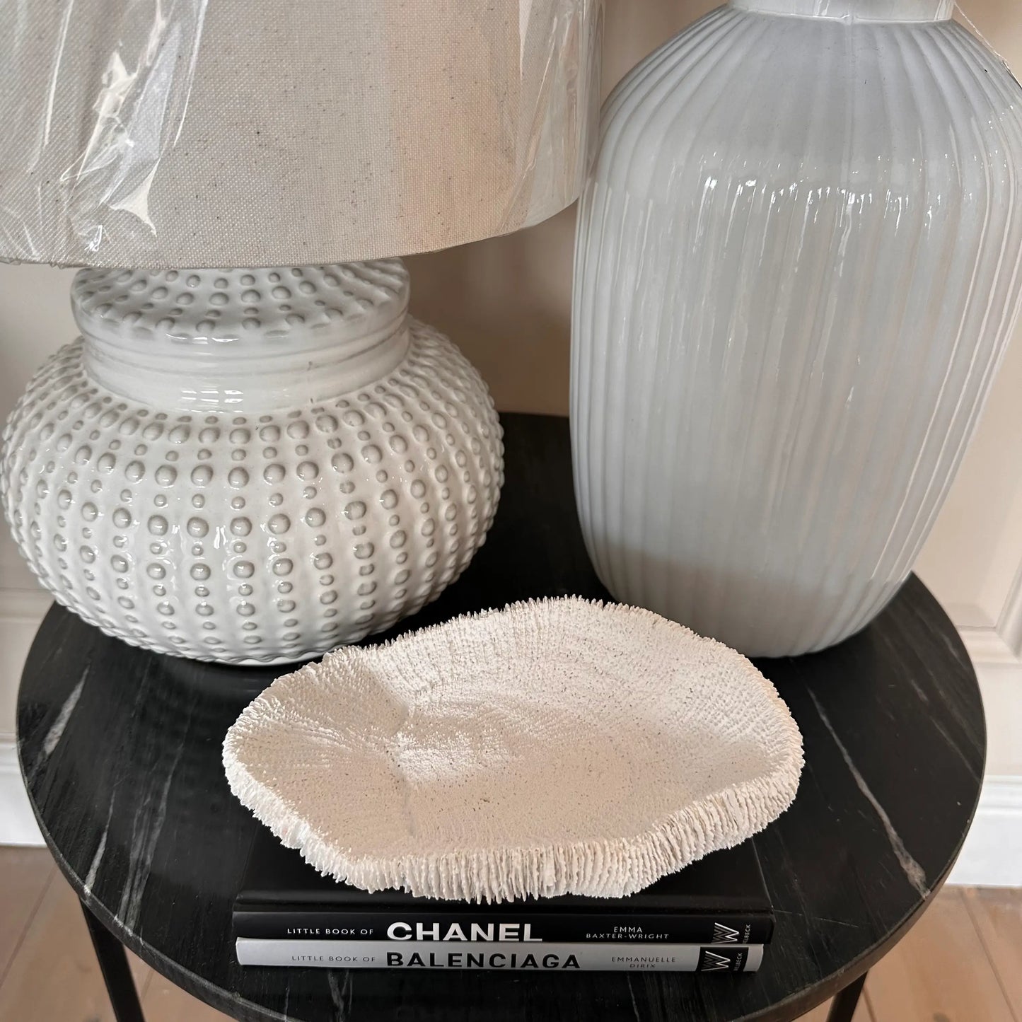 white-squat-dimple-lamp-with-white-faux-fungia-coral-bowl-ornament-at-albury-house-interiors-coffee-shop-essex