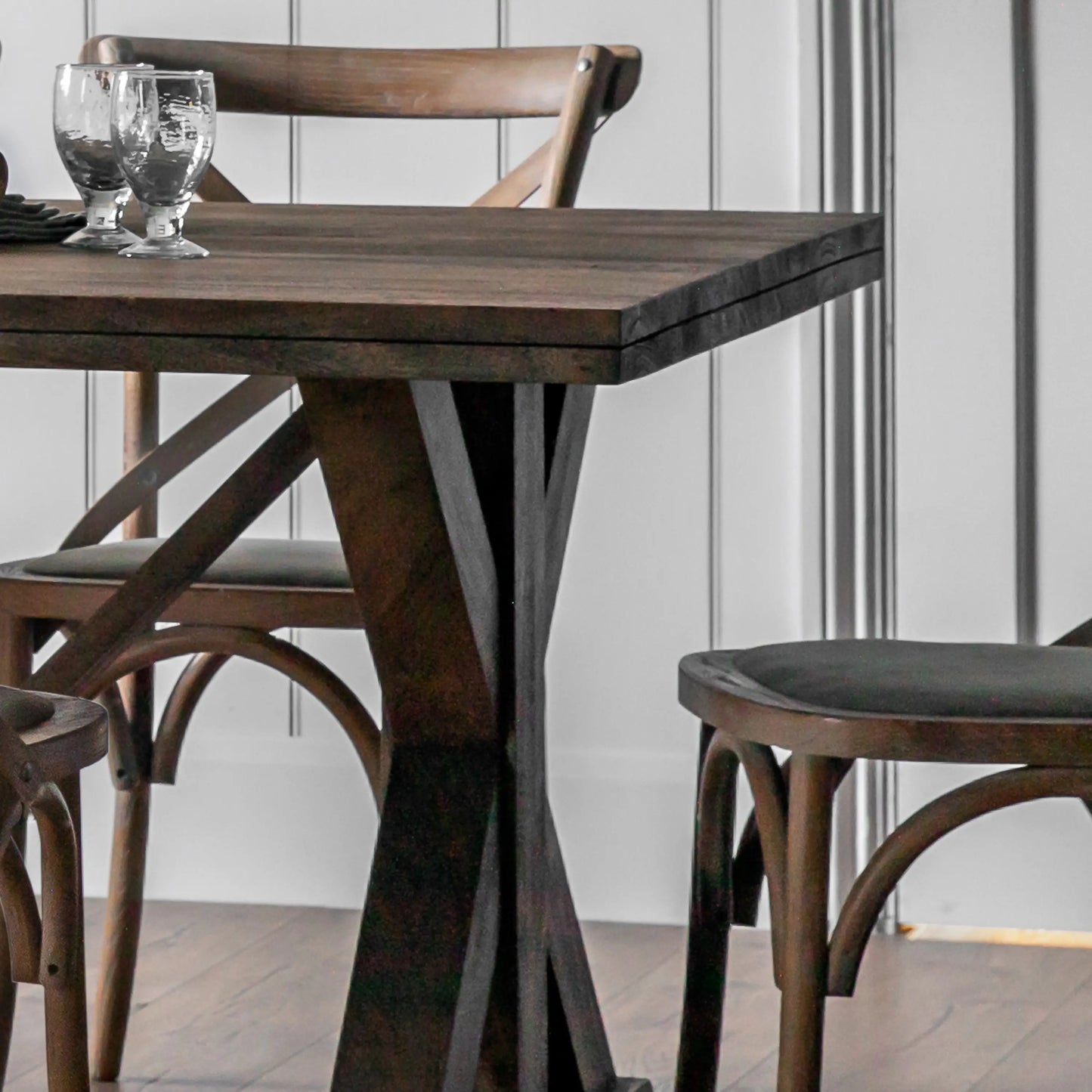 Hayfield solid mango wood rectangle dining table available in sizes small and large to seat 6 or 8 people, with X shaped legs. Purchase at Albury House Interiors. 