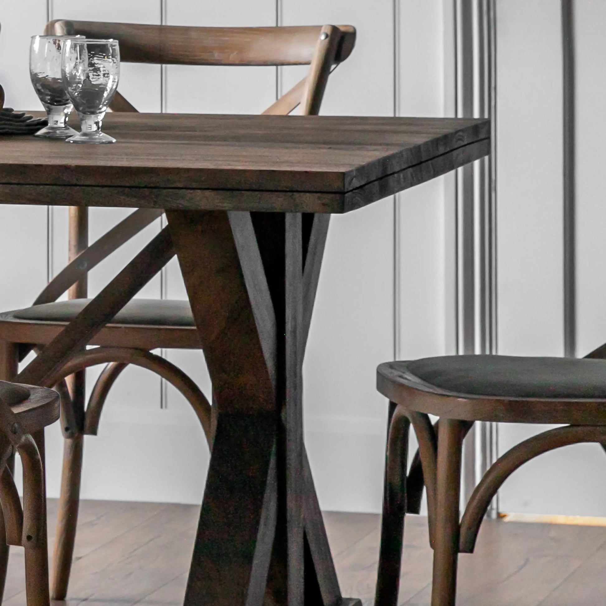 Hayfield solid mango wood rectangle dining table available in sizes small and large to seat 6 or 8 people, with X shaped legs. Purchase at Albury House Interiors. 