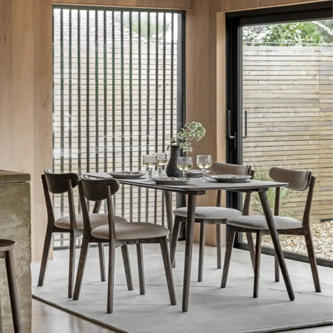 Haze dark wooden veneered dining table with matching dining chairs, in sizes small and large. Available to purchase at Albury House Interiors. 
