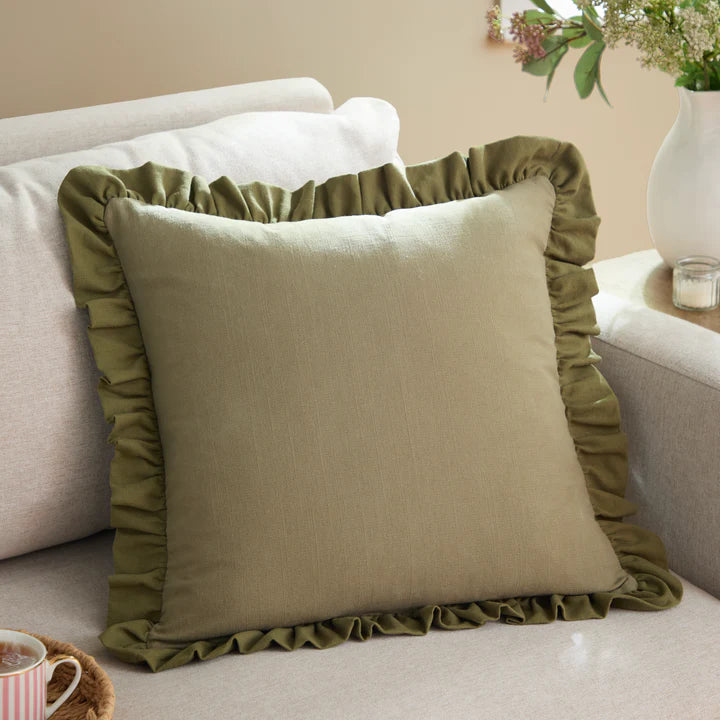Issie sage green velvet square cushion with ruffled edge, feather filled