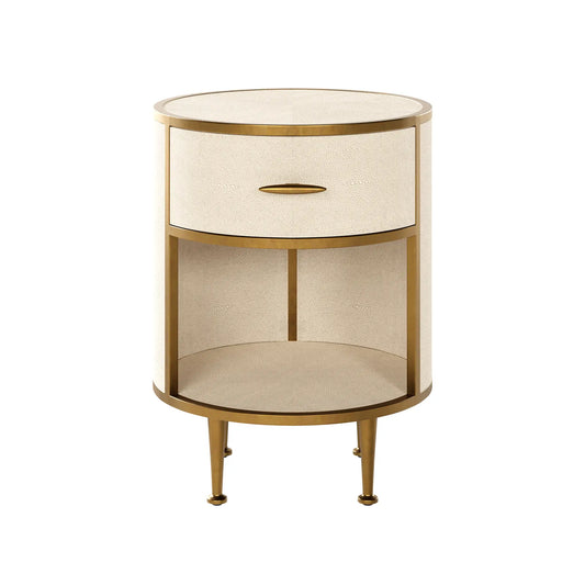 faux-ivory-shagreen-fabric-bedside-tables-ound-in-shape-with-antique-brass-metal-frame-and-legs-with-single-drawer-and-shelf-interior-design-essentials-at-albury-house-interiors