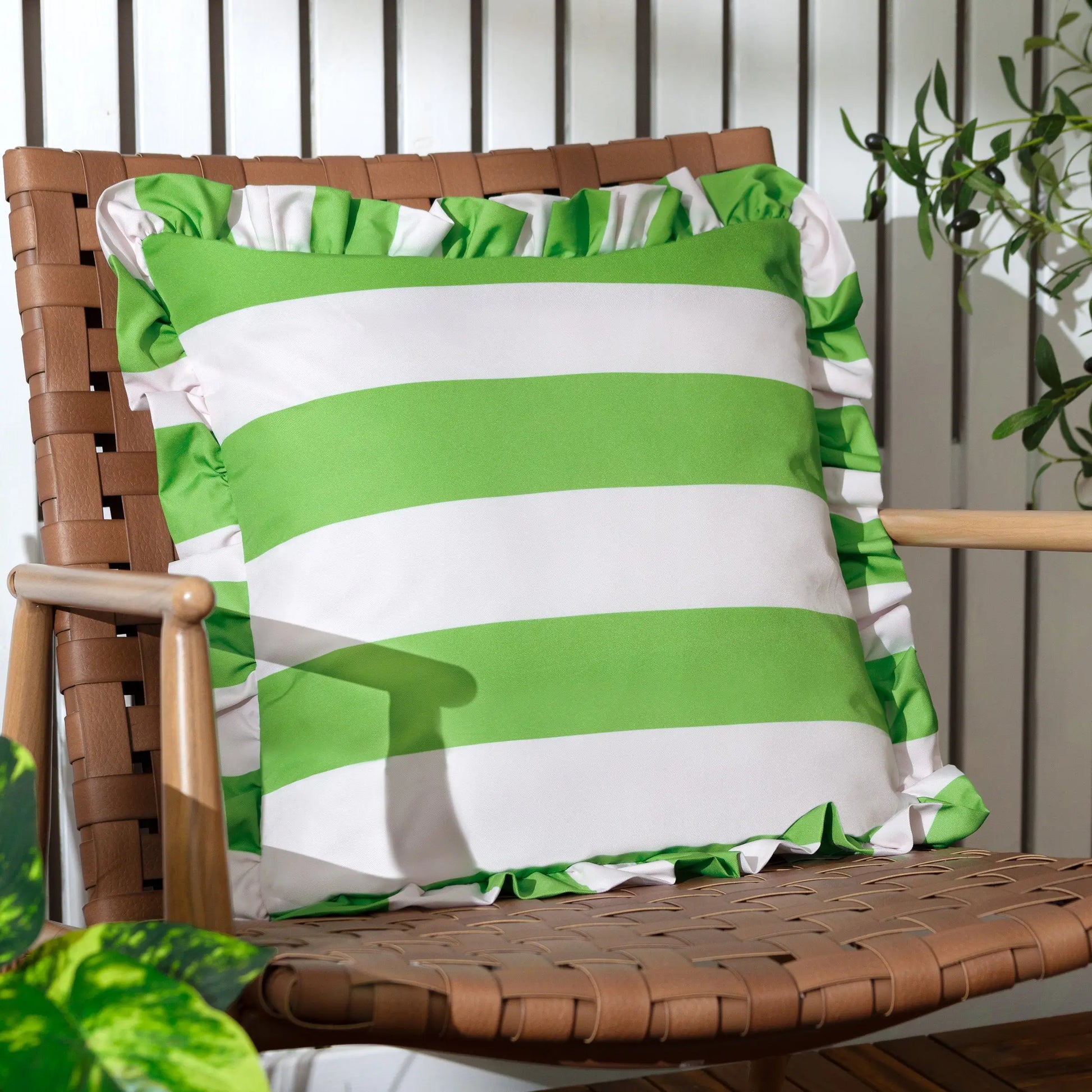 lime-green-and-white-double-sided-striped-outdoor-cushion-with-ruffle-edge-at-albury-house-interiors 