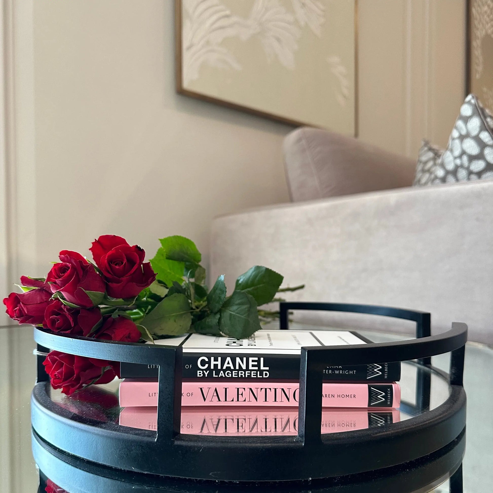 little-book-of-valentino-and-chanel-by-lagerfeld-on-black-mirror-round-tray-albury-house-interiors