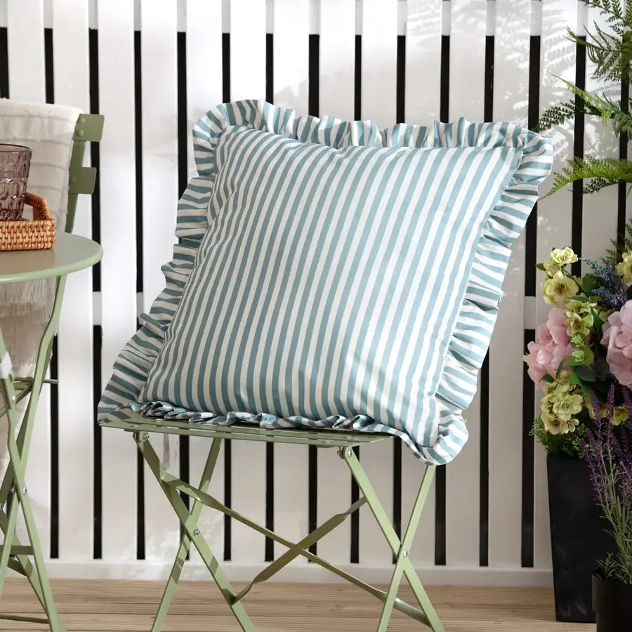 lottie-square-water-resistant-outdoor-cushion-with-white-and-duck-egg-blue-striped-and-ruffled-detail-edge-at-albury-house-interiors