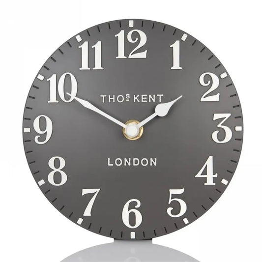 small-round-thomas-kent-mantel-clock-with-dark-grey-face-and-white-numbers-and-hands-at-albury-house-interiors