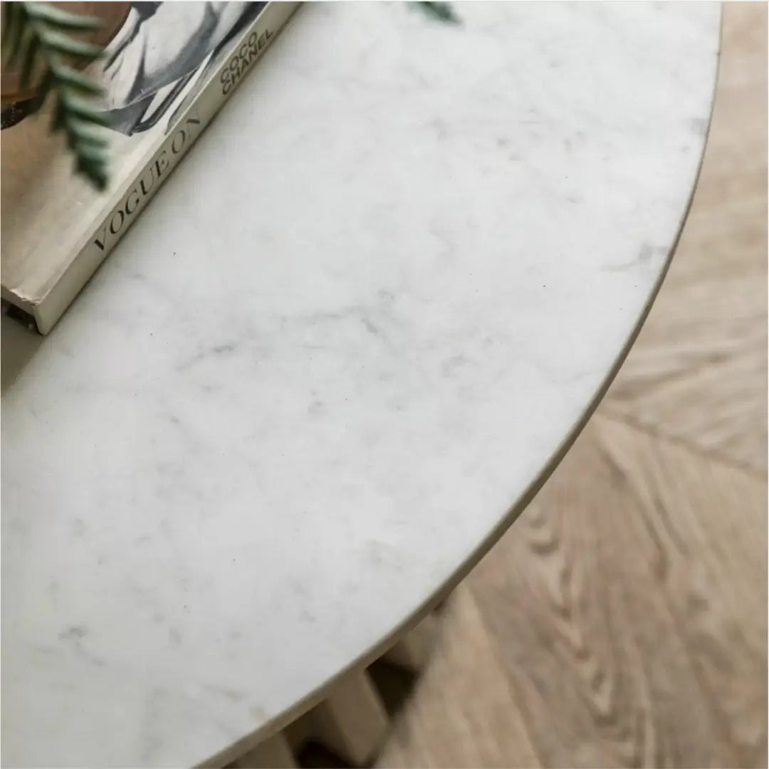 Mayfair round coffee table crafted from whitewashed mango wood and sand blasted for effect, complete with natural white veined marble top. This range is available to purchase from Albury House Interiors, Essex. 