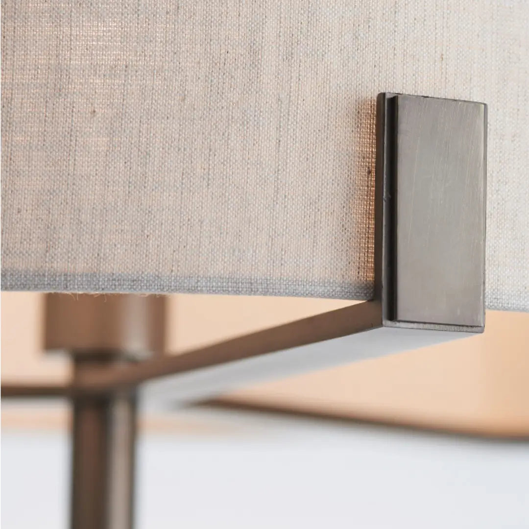 Minnesota floor lamp with dark brushed bronze base and metalwork, finished with a beautiful natural linen lampshade, available in small and large at Albury House Interiors. 