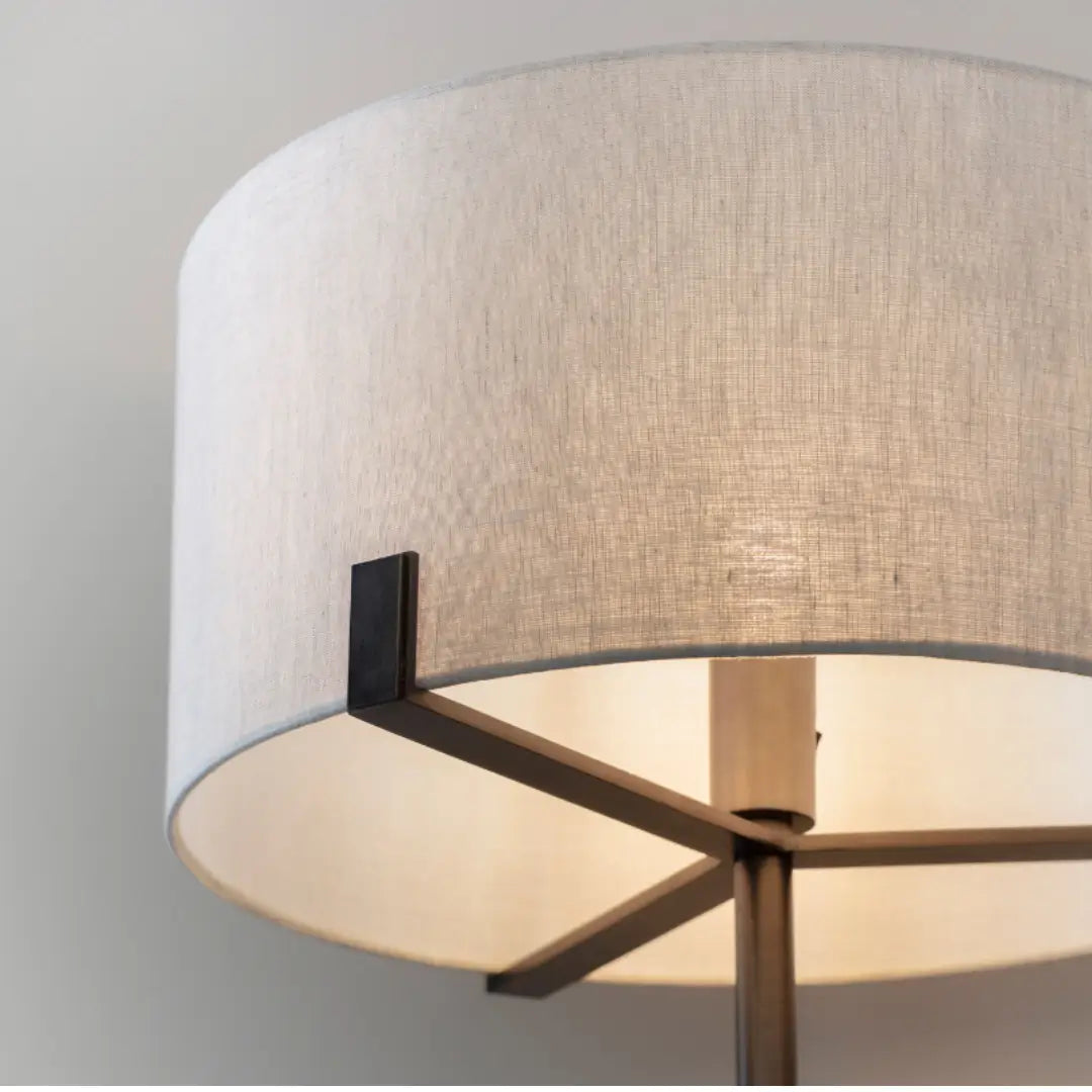 Minnesota floor lamp with dark brushed bronze base and metalwork, finished with a beautiful natural linen lampshade, available in small and large at Albury House Interiors. 