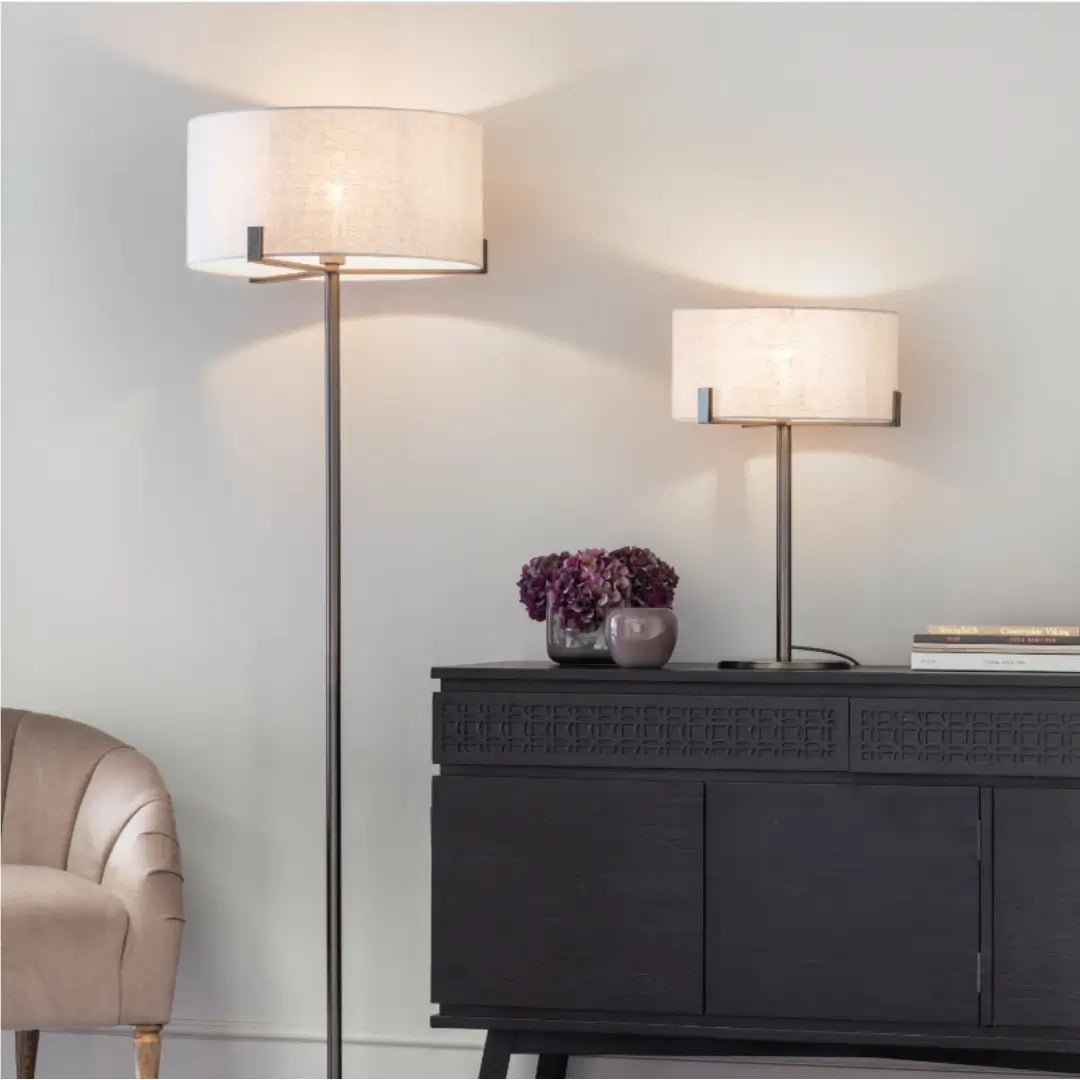 Minnesota floor lamp with dark brushed bronze base and metalwork, finished with a beautiful natural linen lampshade, available in small and large at Albury House Interiors. 