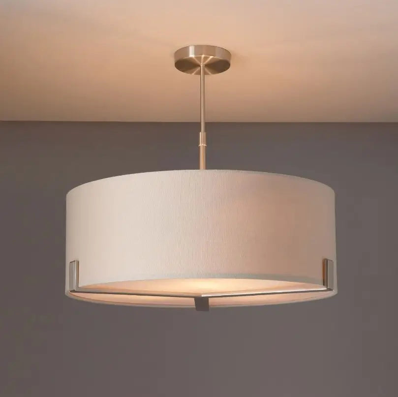 Minnesota round ceiling light with a brushed nickel finish, featuring three lightbulbs and a neutral-colored linen-effect lampshade. Available for purchase at Albury House Interiors.