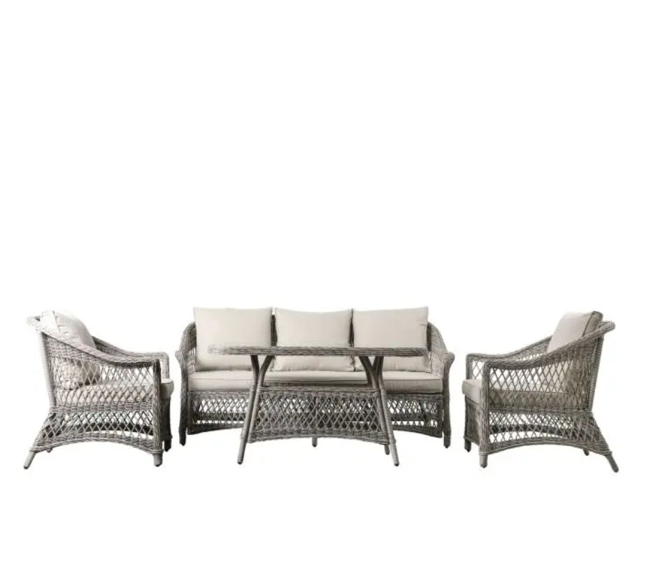Moreton stone grey colour rattan outdoor furniture, 3-seater sofa, two armchairs and a dining table with showerproof seat and back cushions, available at Albury House Interiors