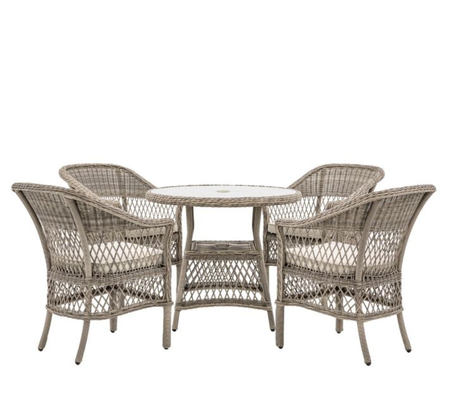 Moreton stone grey colour rattan outdoor furniture, 6 chairs and a glass topped round dining table with showerproof seat and back cushions, available at Albury House Interiors