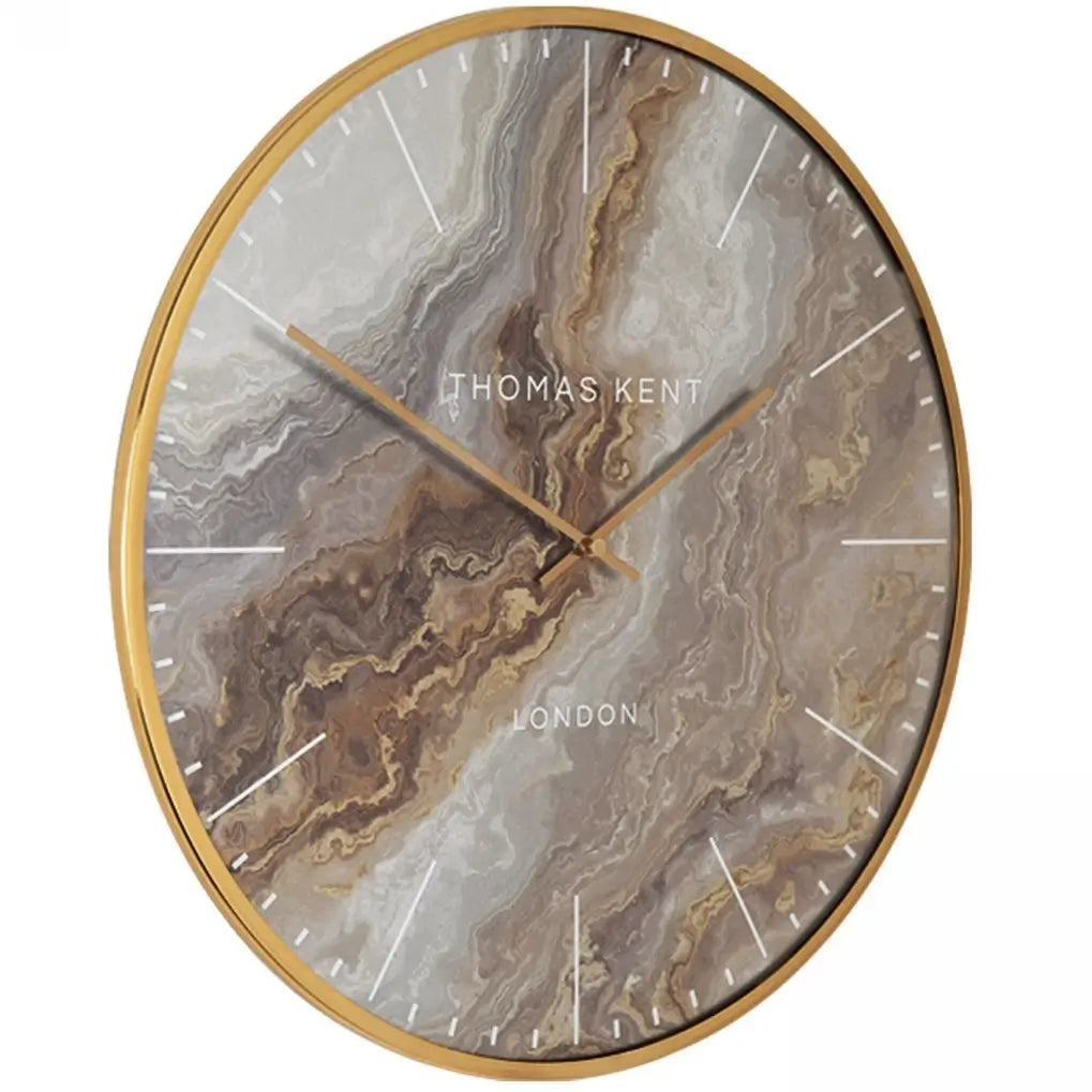 Naples abstract marble effect round wall clock, with swirls of brown, neutral and gold, finished with a gold foil rim and matching hands. Available to purchase at Albury House Interiors.