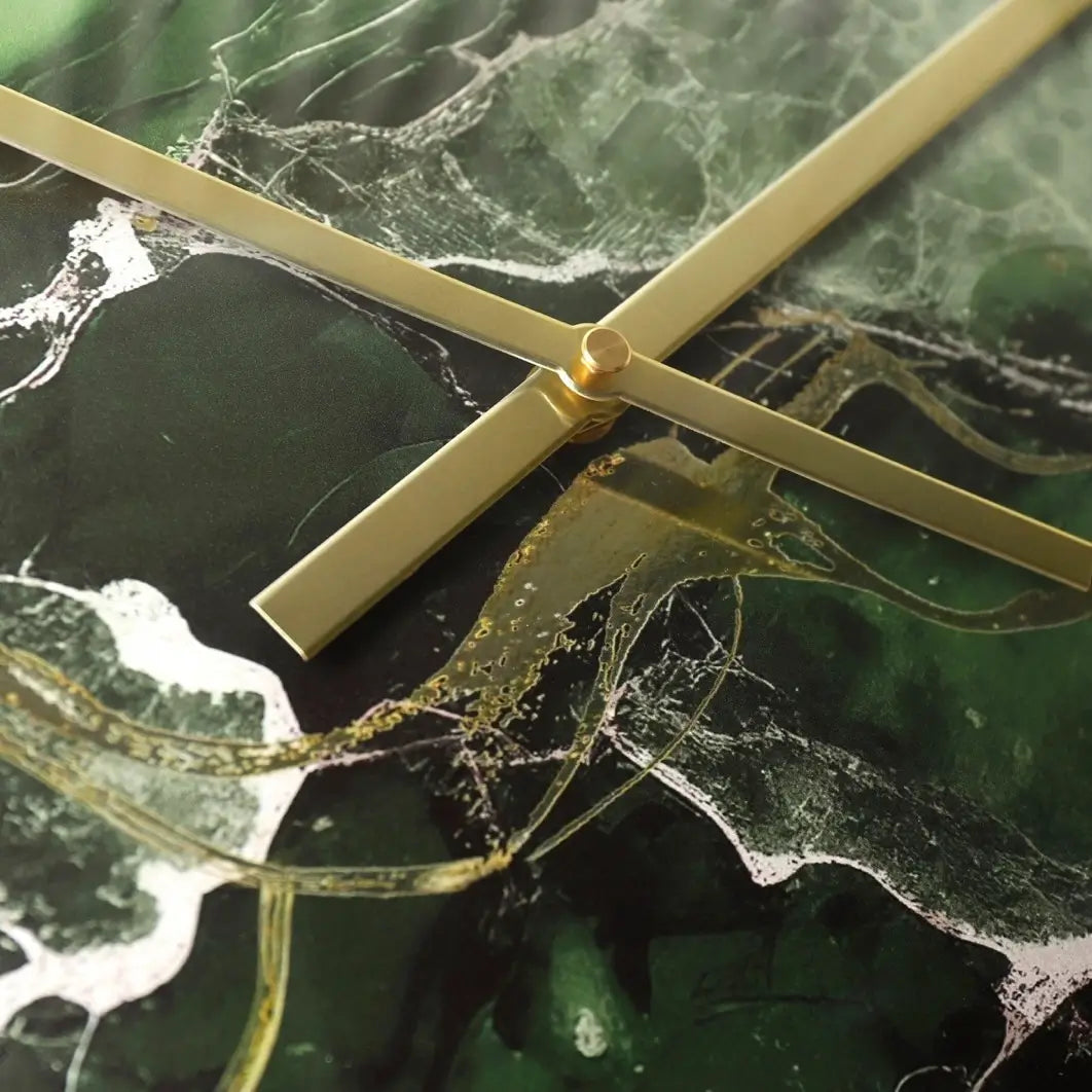 Naples round wall clock with emerald green, white and gold swirls throughout creating a marble effect. Finished with a glass domed front and gold rim with matching hands. Available to purchase at Albury House Interiors. 