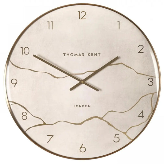 Naples round wall clock crafted by Thomas Kent, inspired by Japanese Kintsugi of fixing ceramics that have been broken. A faux stone clock face with gold veined detailing with matching hands and rim. Available to purchase at Albury House Interiors Essex.
