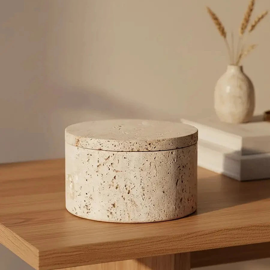 Round trinket box with lid crafted from natural travertine stone with different textured and patterns on every one. Perfect for storing smaller items in all rooms. Available to purchase from Albury House Interiors.