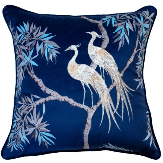 Navy blue square velvet cushion, with embroidered crane birds and delicate tree and leaf detailing, at Albury House Interiors