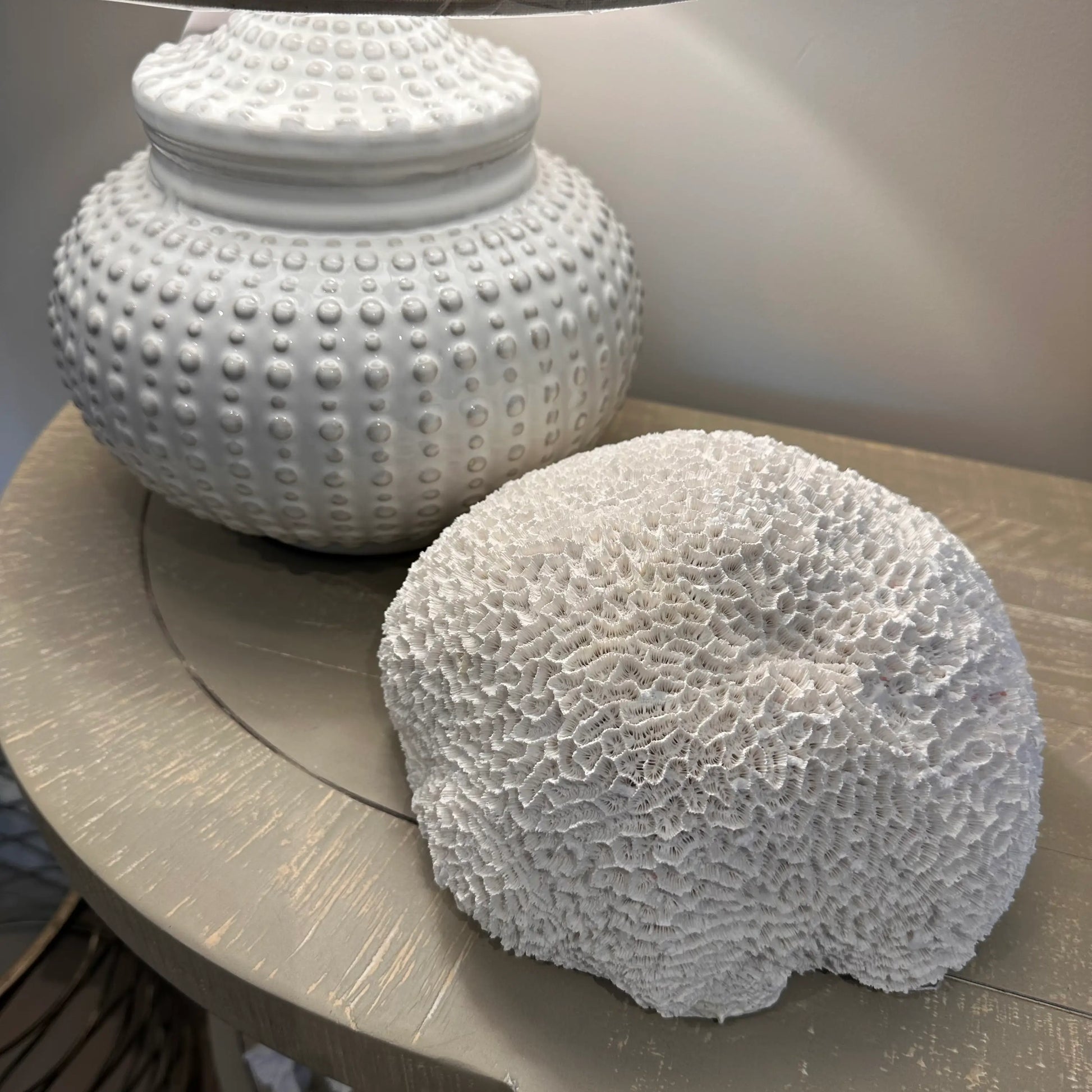 white-ceramic-dimple-squat-lamp-with-linen-shade-textured-nerina-faux-coral-at-albury-house-interiors