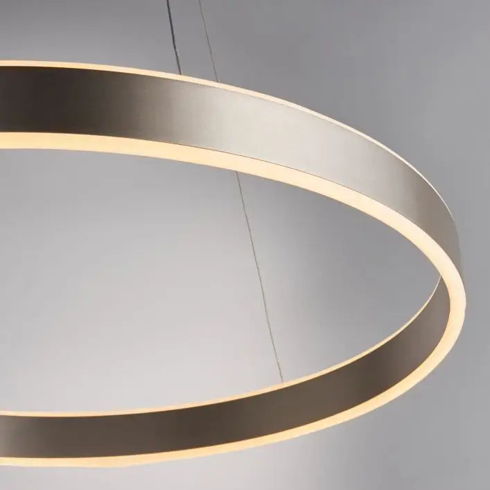 Nickel round halo ceiling light, suspended from thin wires giving a beautiful glow in living rooms, kitchens, bedrooms, dressing rooms. Available at Albury House Interiors, Matching Tye, Essex. 