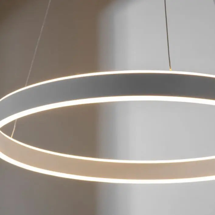 Nickel round halo ceiling light, suspended from thin wires giving a beautiful glow in living rooms, kitchens, bedrooms, dressing rooms. Available at Albury House Interiors, Matching Tye, Essex. 