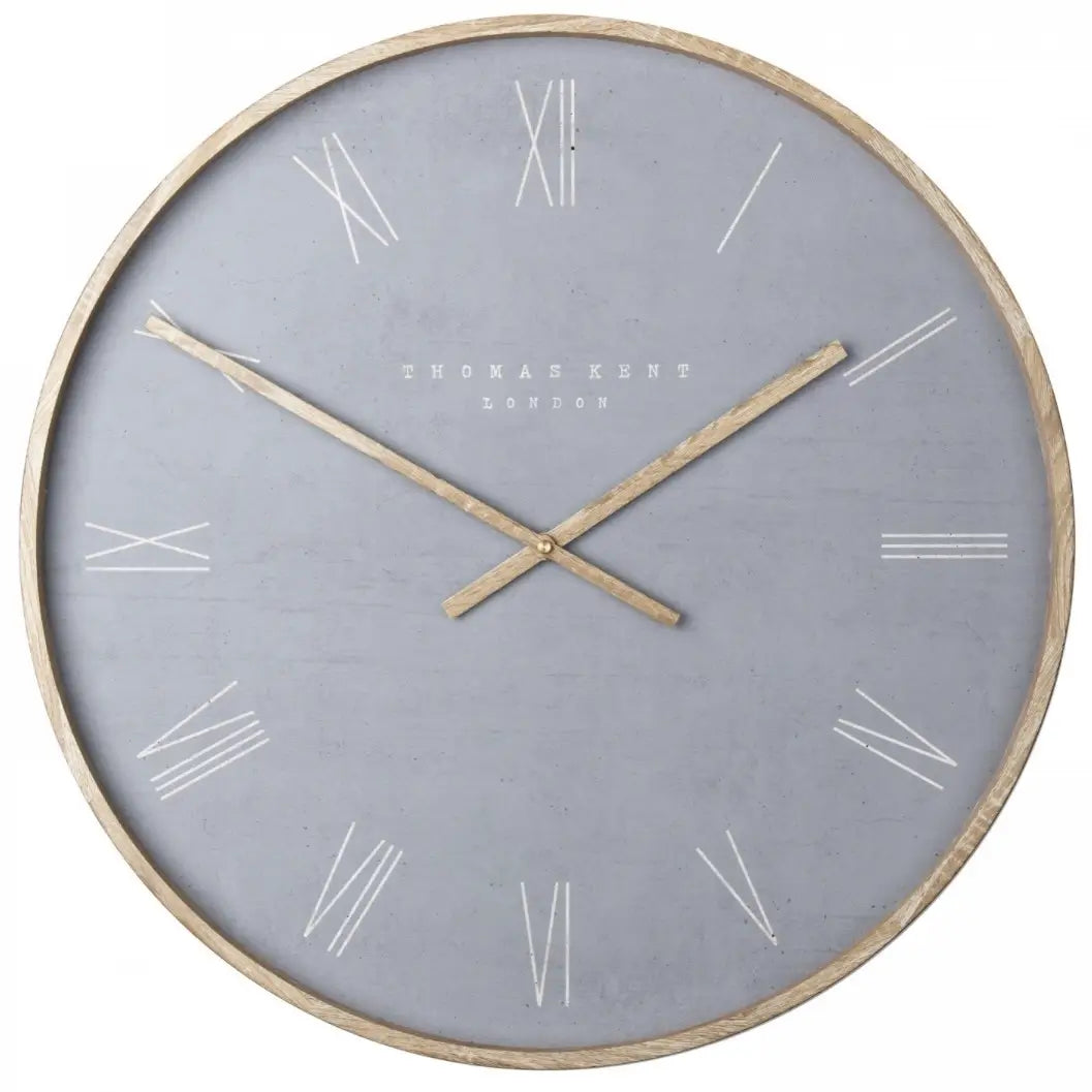 Norway round wall clock in cement grey with wooden effect hands and front rim and roman numeral numbers. Available to purchase at Albury House Interiors.