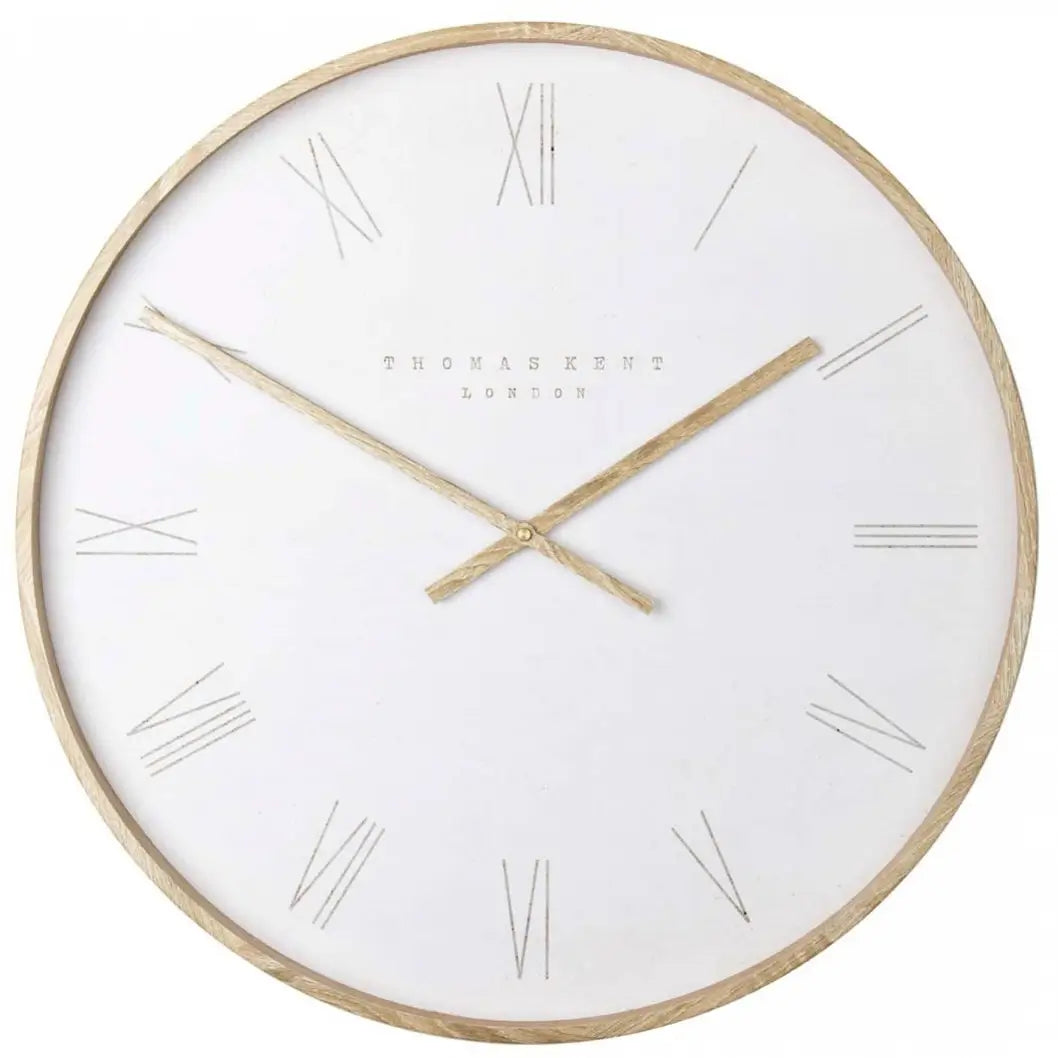 Norway round wall clock with white face and matching outer rim, and wooden effect hands and front edge. Available to purchase at Albury House Interiors, homewares shop in Essex.