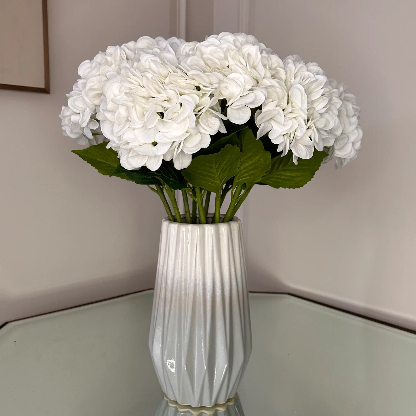 Ombre grey and white dipped effect vases in size small with abstract detail all over, showcasing faux white hydrangeas. Available to purchase at Albury House Interiors, Matching Tye Essex. 