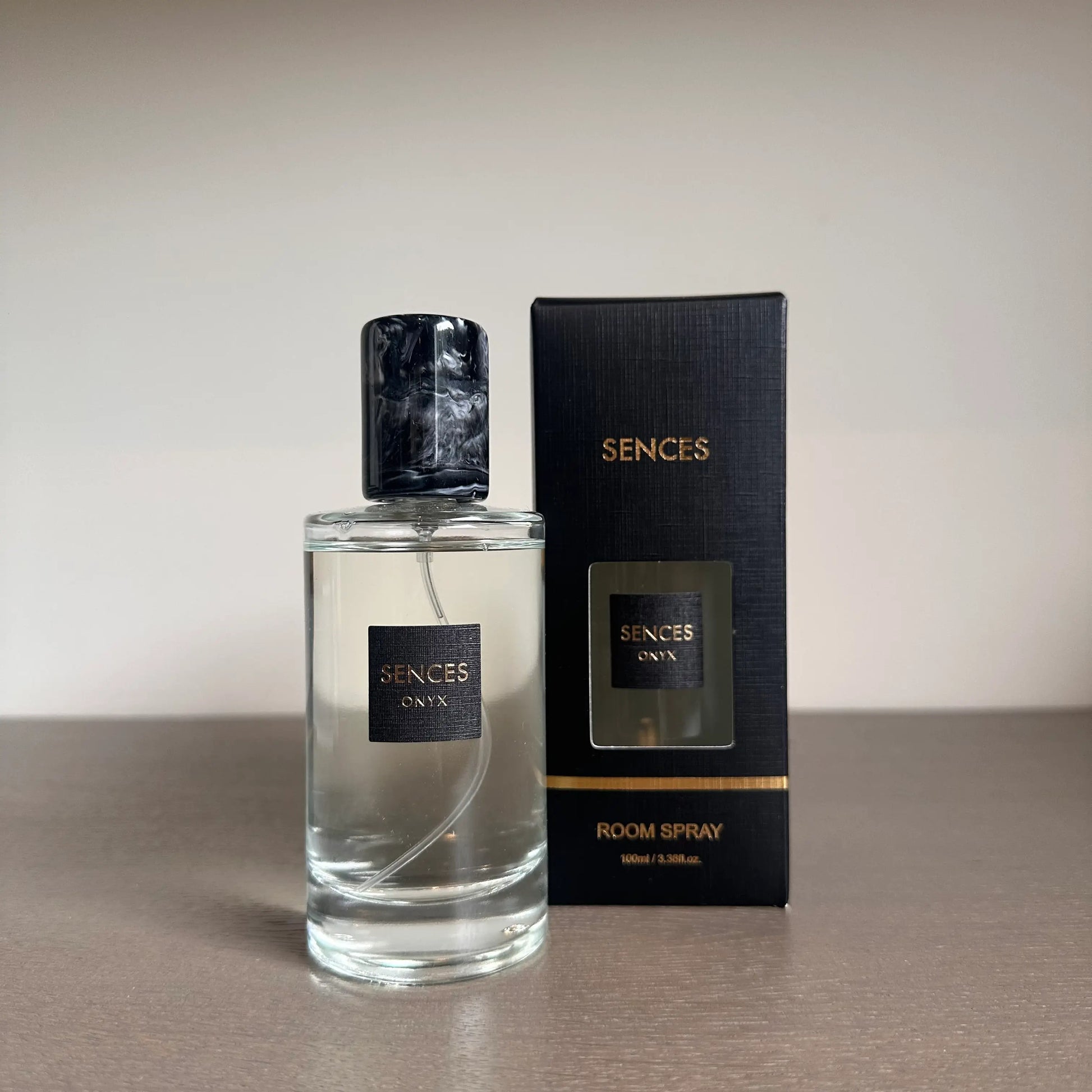 Sences onyx roomspray in alang alang scent with lack marbled lid and matching gift box. Available to purchase at Albury House Interiors.
