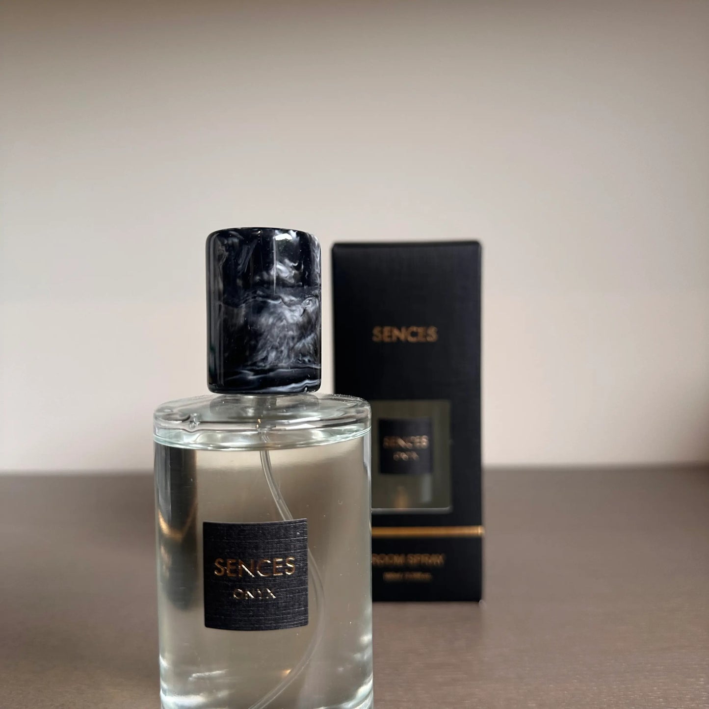 Sences onyx roomspray in alang alang scent with lack marbled lid and matching gift box. Available to purchase at Albury House Interiors.