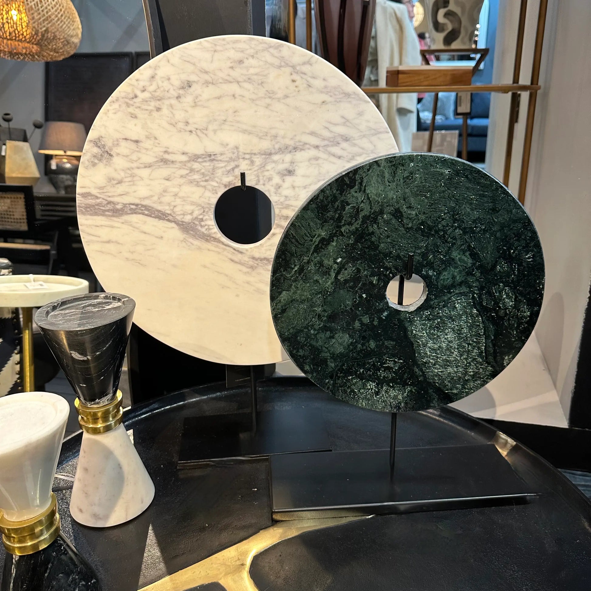 white-and-green-marble-discs-on-matt-black-stands-on-coffee-table-at-albury-house-interiors